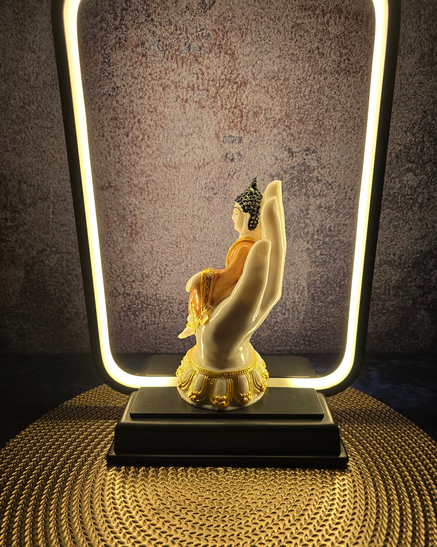 Palm Buddha with light