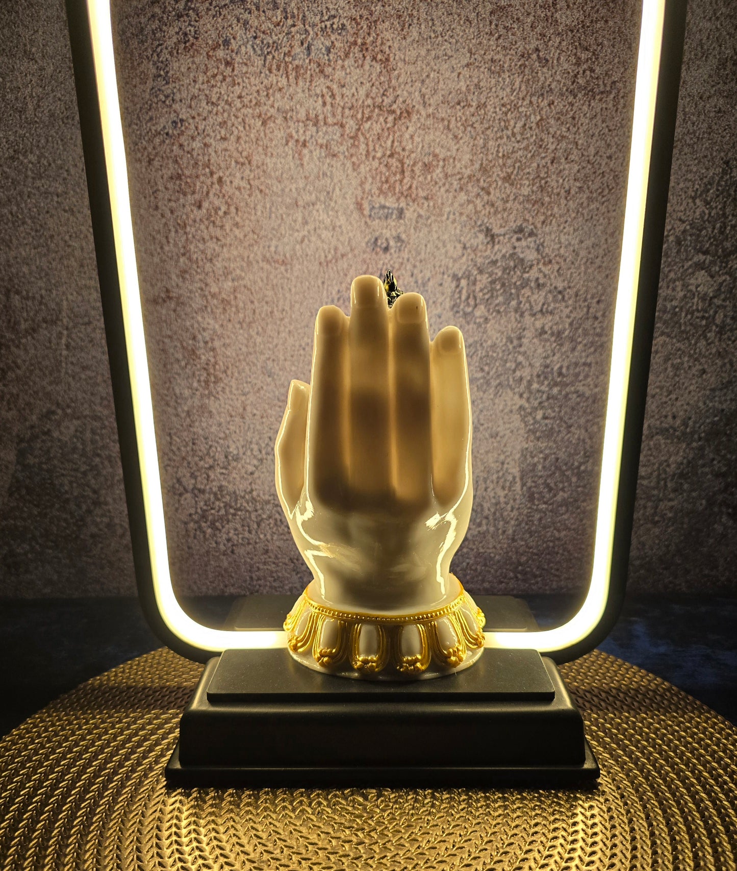 Palm Buddha with light